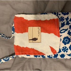 Small reversible crossbody pouch